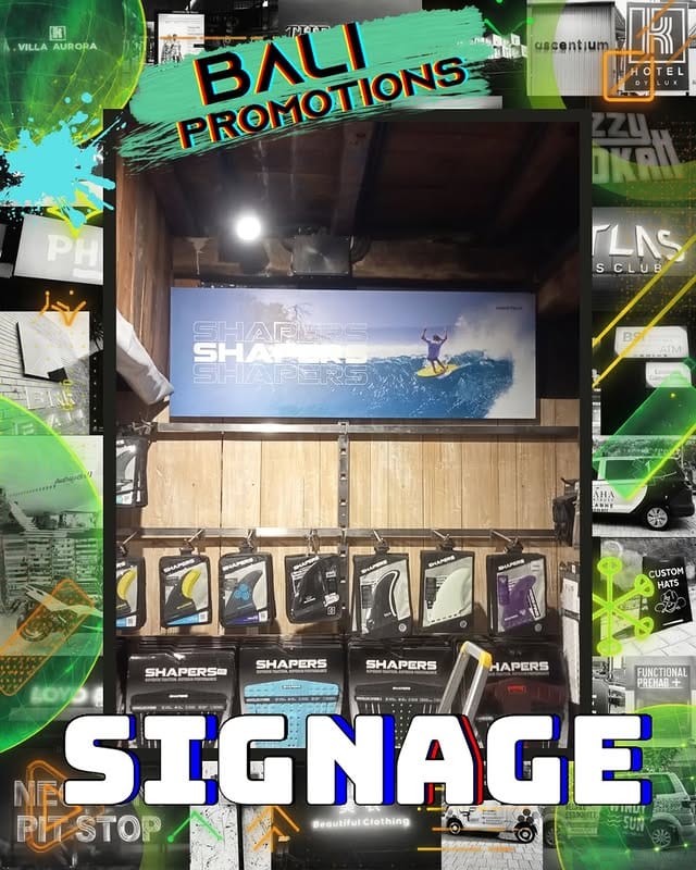 Desain eksterior signage untuk branding surfing bali terpasang kokoh pada dinding kayu butik selancar mewah.